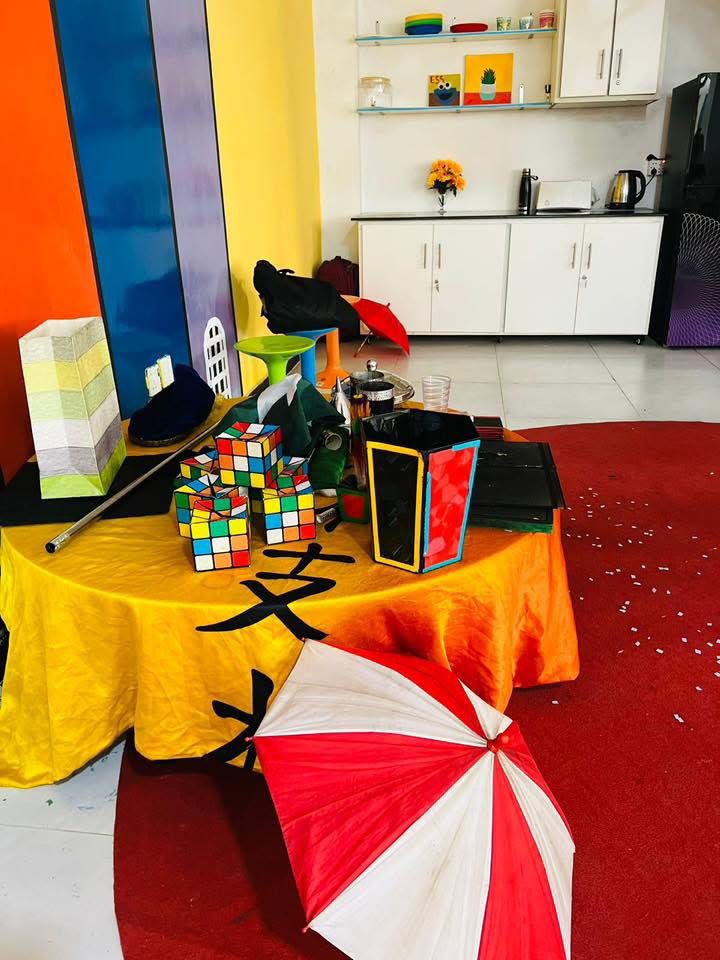 Colorful activity room with magic props and creative displays